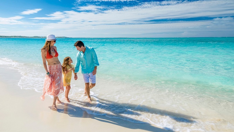 Família em praia de Cancún